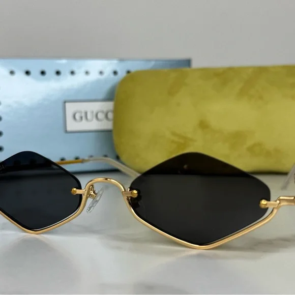 Gucci Women\'s Sunglasses with Gold Frame and Black Lenses Gucci GG0649SK Women Oval Polarized Sunglasses Black/Gold  main image 4